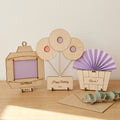 Personalised wooden money holders in engraved birch: lantern, balloon bunch and cupcake designs