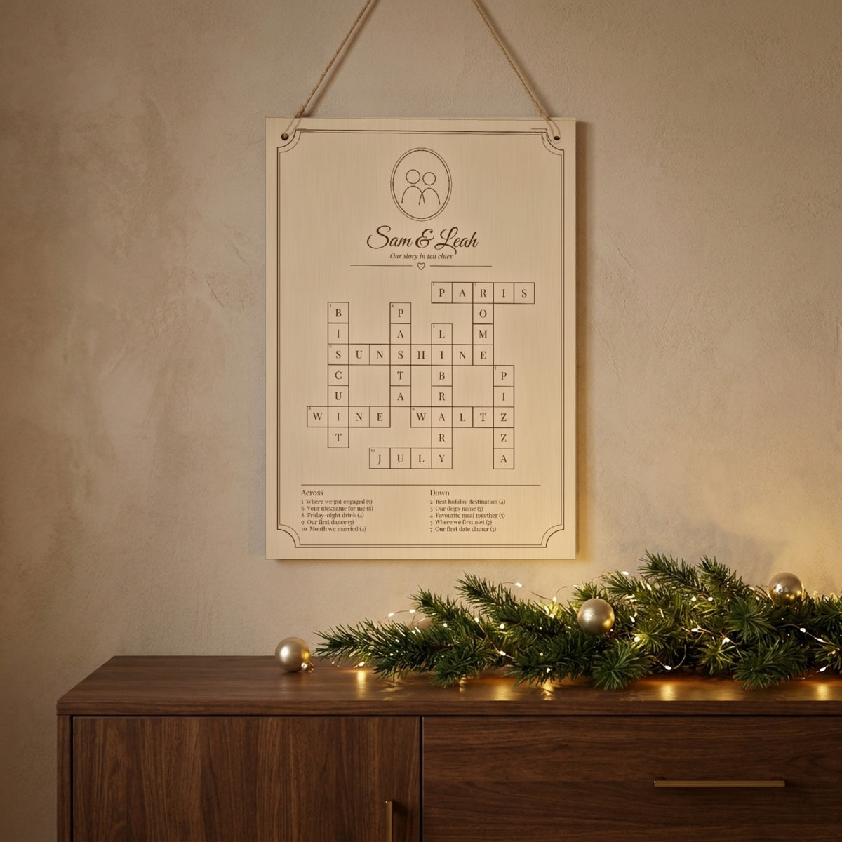 Personalised crossword as a Christmas gift above a garland
