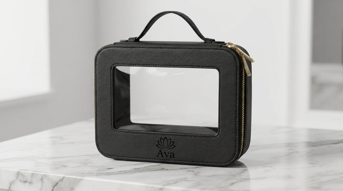 Black clear make-up bag engraved with a lotus above the name Ava