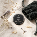 Black pocket token engraved A little token to say I love you on linen with dried flowers