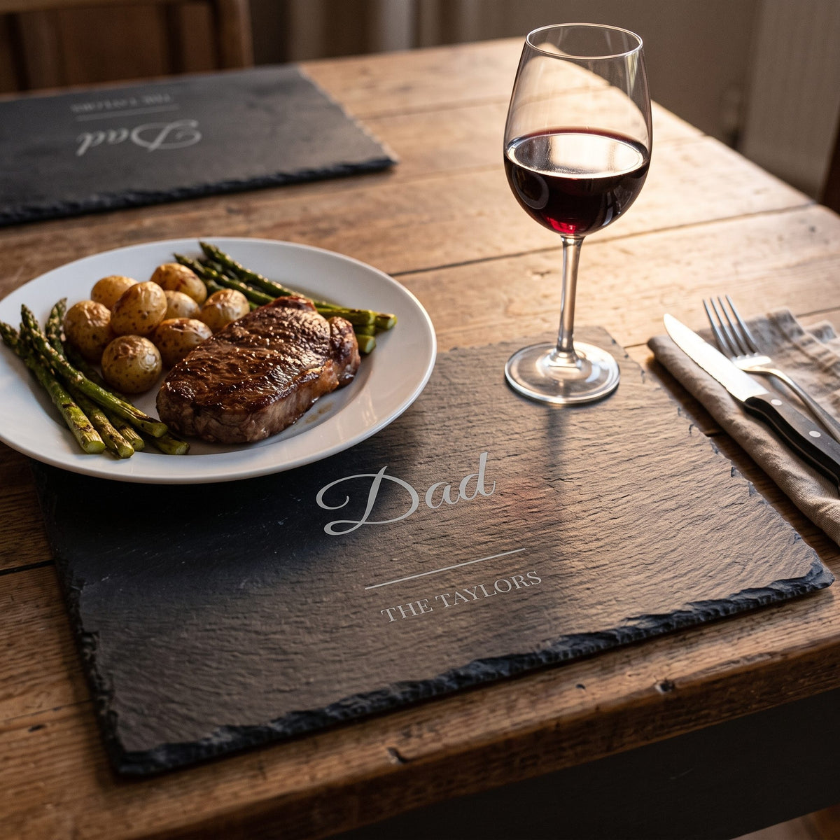 Slate placemat engraved Dad with a steak dinner and red wine